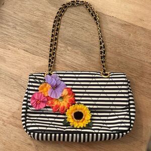 Beverly Feldman black and white striped handbag with flowers and chain strap